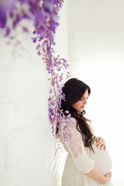 Floral studio maternity photos by Tracy Layne