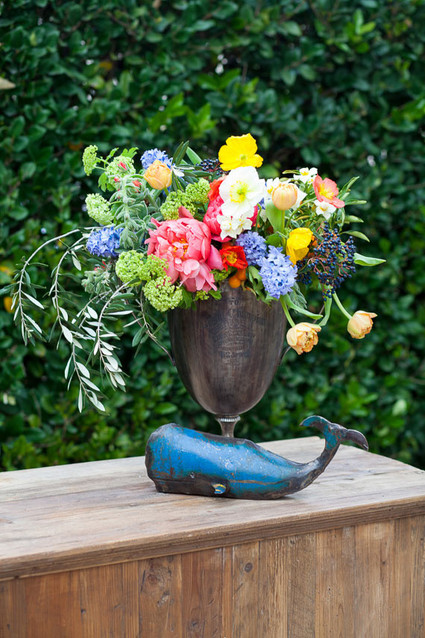 Bronze centerpiece with colorful flowers