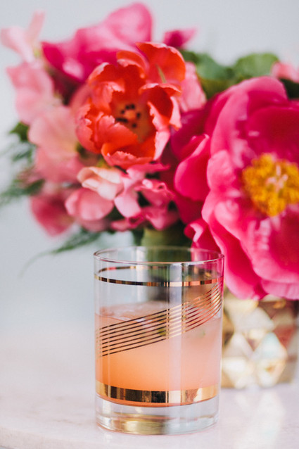 Gold glassware with peach cocktail