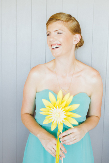 Bridesmaid with DIY yellow paper flower bouquet
