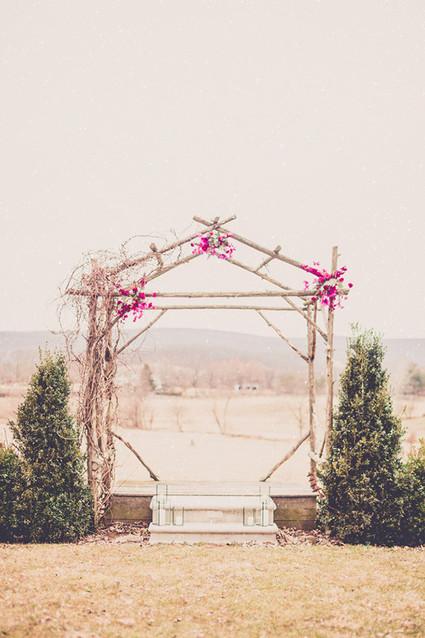 Rustic wooden ceremony arch