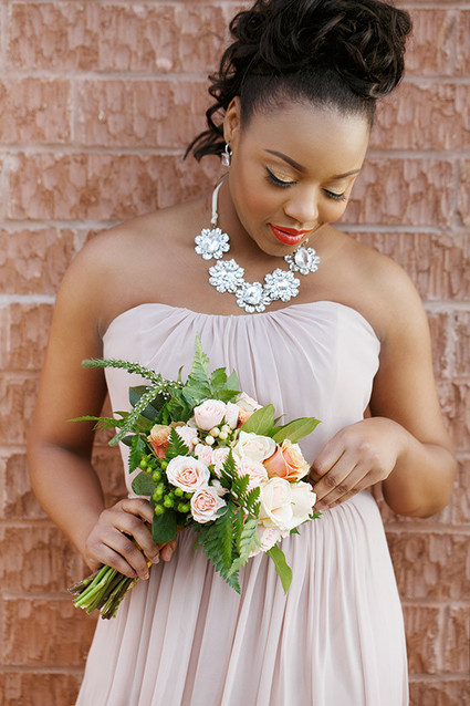 Pink bridesmaid gown with statement necklace
