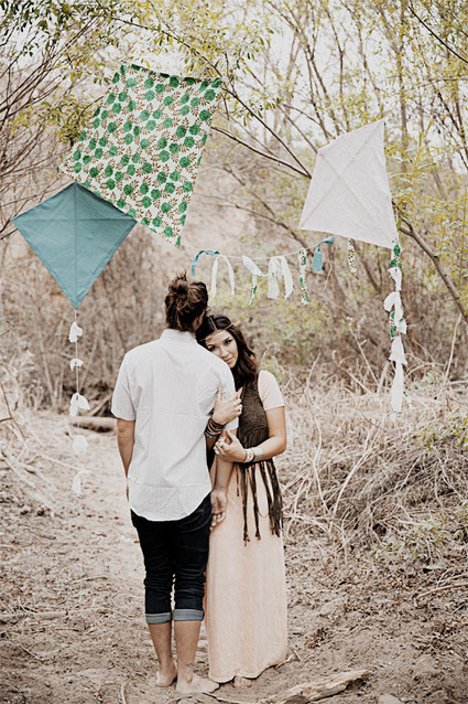 Bohemian inspired engagement portrait with kite decor