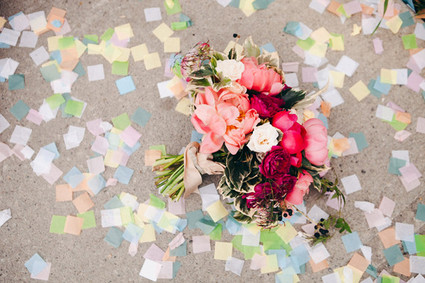 Confetti with pink and red bouquet