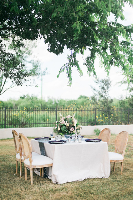 Romantic outdoor wedding tablescape
