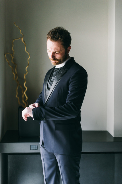Dark blue grooms suit