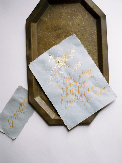 Handwritten gold calligraphy