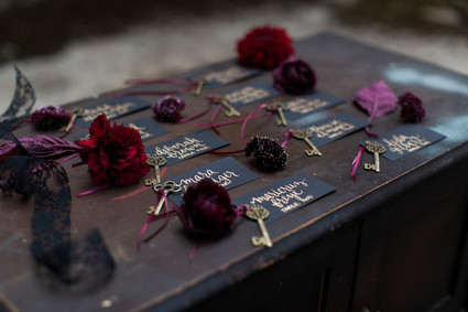 Gold calligraphy escort cards