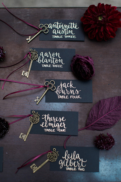 Gold calligraphy escort cards
