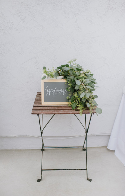welcome sign with eucalyptus