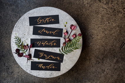 Gold and black place cards Inspiration