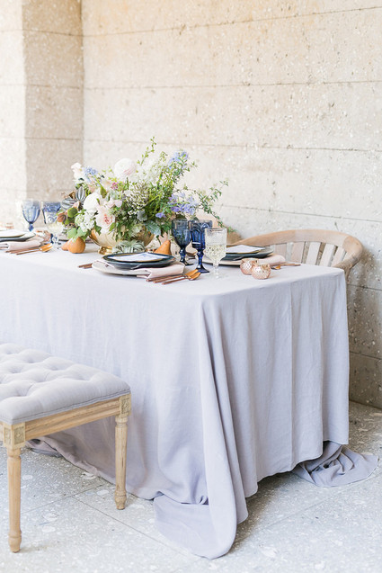 Soft blue spring wedding tablescape
