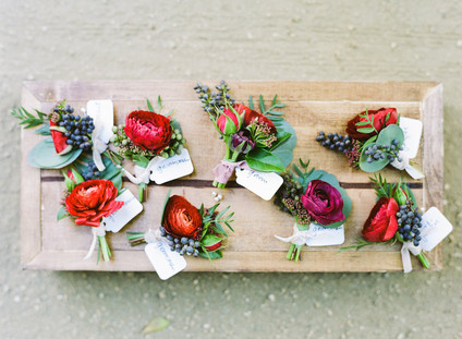 Red florals boutonniÃ¨res