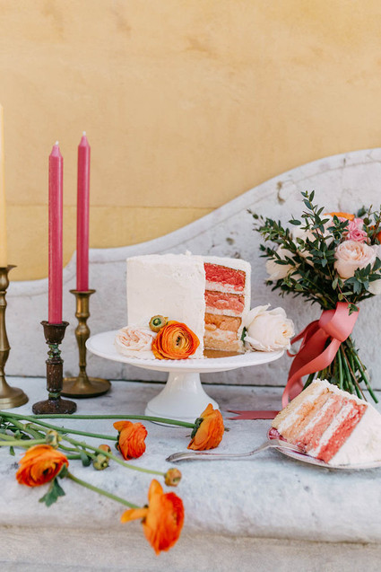 White and orange wedding cake