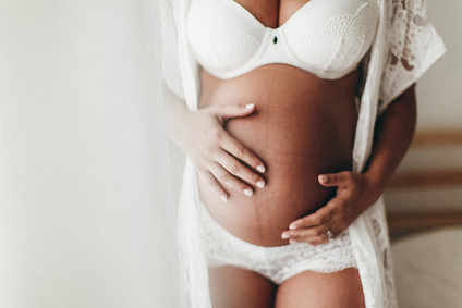 all white boudoir maternity photos