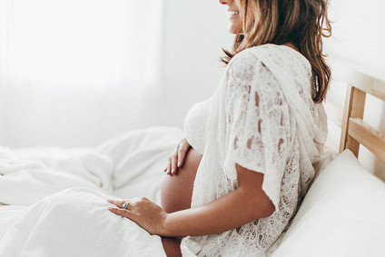 all white boudoir maternity photos