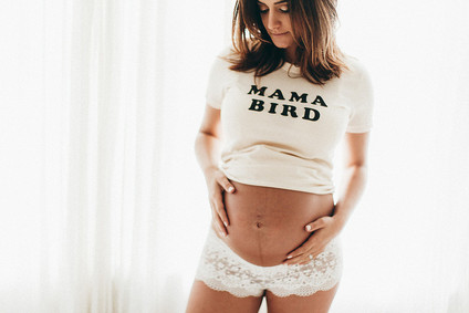 all white boudoir maternity photos