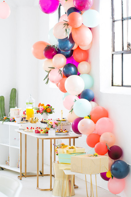 dessert table with balloons