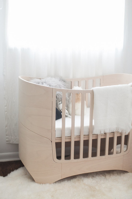 white and wood bohemian modern nursery