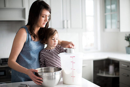 mother daughter baking session at home