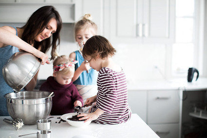 mother daughter baking session at home