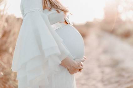 all white bohemian maternity photos