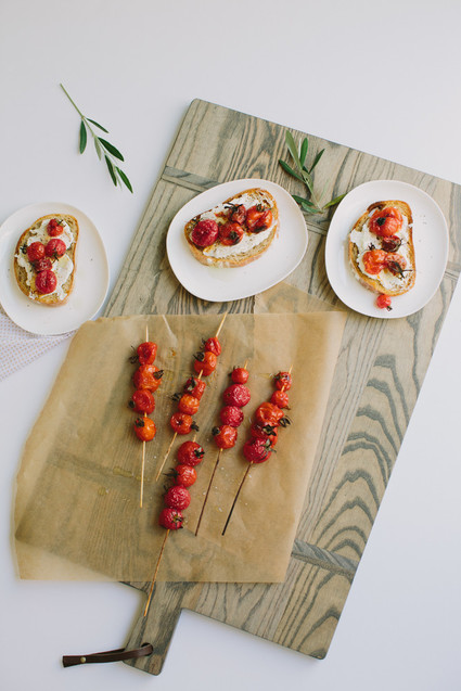 Grilled tomato skewers on toast