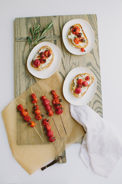 Grilled tomato skewers on toast