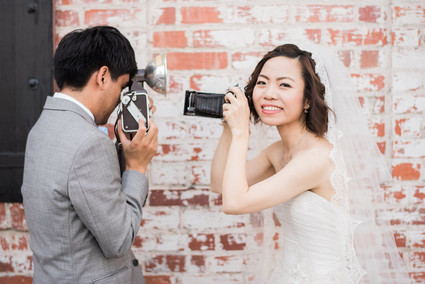wedding portraits with vintage cameras