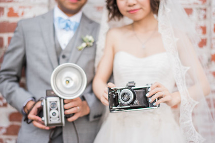 wedding portraits with vintage cameras