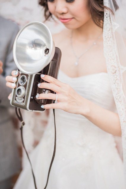 wedding portraits with vintage cameras