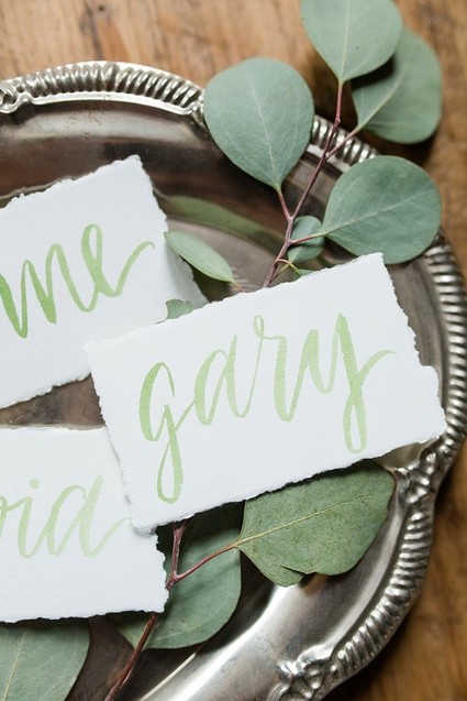 green calligraphy place cards
