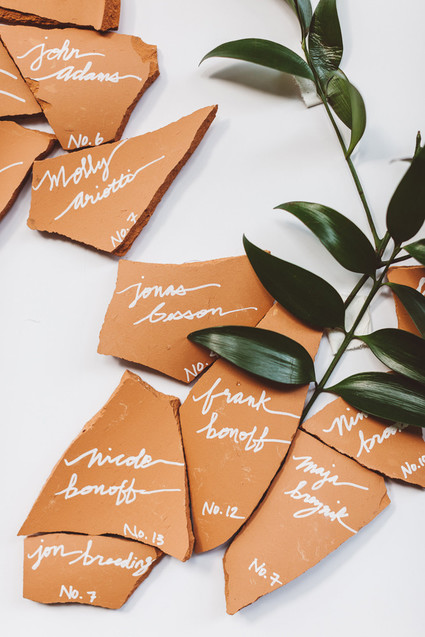 Whimsical escort card signage