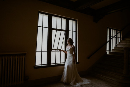 By Lillian West wedding gown