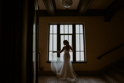 By Lillian West wedding gown