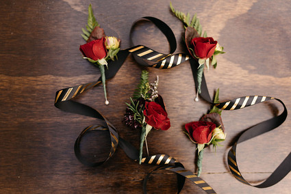 Red rose boutonnières