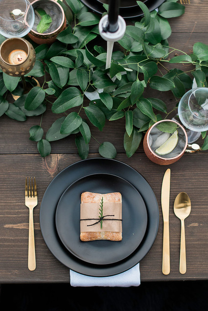 Black and gold place setting