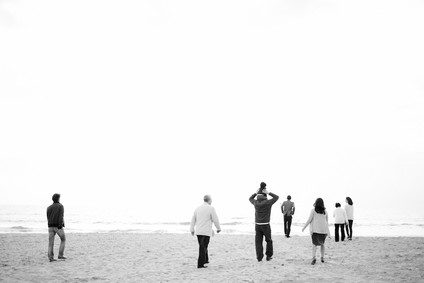 multi generation family photos at the beach