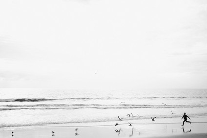 multi generation family photos at the beach