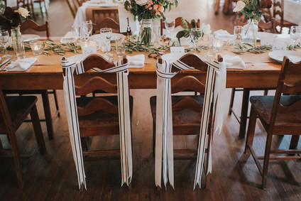 Bride and groom chairs