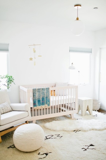 Modern, bright designer nursery by Almost Makes Perfect