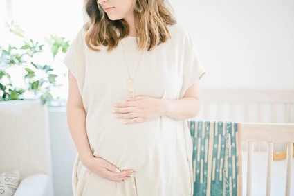 Modern, bright designer nursery by Almost Makes Perfect