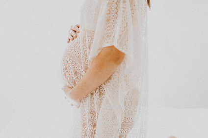 All white bohemian maternity photos