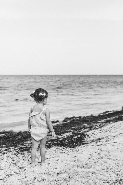Summery matching sibling photos on the beach