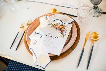 Gold and wood place setting