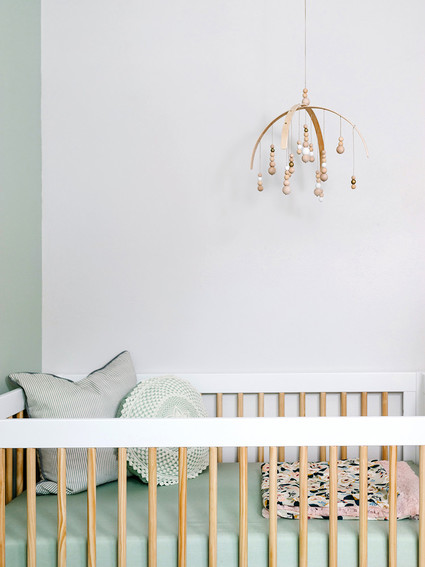 Mint and white nursery design