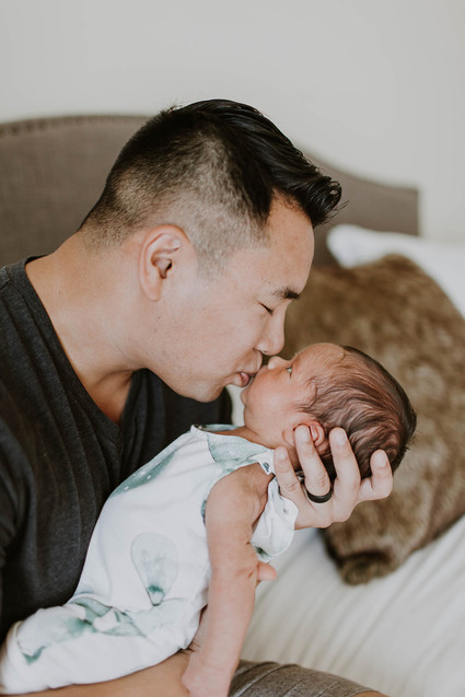 Father son newborn photos