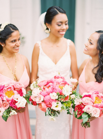 bride and bridesmaids in pink