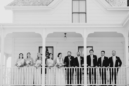 Farmhouse wedding party portrait