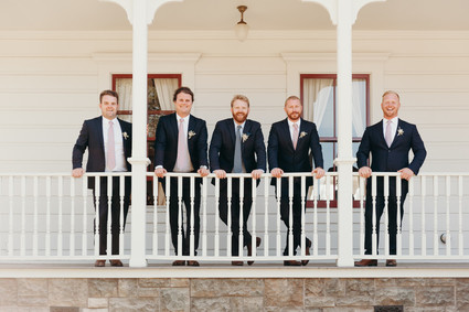 Farmhouse wedding party portrait